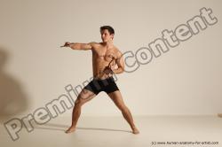 Underwear Fighting with axe Man White Muscular Short Brown Dynamic poses Academic